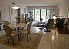 Open floorplan with double sliding doors to the balcony.