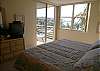 The master bedroom has sliding doors to the balcony, a king size bed, television,vcr, walk-in closet and adjoining bath.