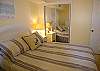 Bedroom with queen size bed.