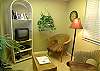 This cozy den is off the entryway and kitchen and has a TV/VCR combo and Sony Playstation!