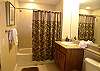 Third bathroom with tub/shower.