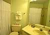 Guest bath with tile shower.