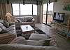 Living room with new leather furniture and flatscreen TV!