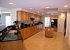 Huge gourmet kitchen even has a pantry and private balcony!