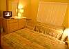 Guest Bedroom with Twin beds &amp; flatscreen TV
