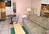 There is a queen size bed as well as a sleeper sofa. Four people can have a great place on the beach for very reasonable rates.