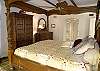 The master bedroom has an en suite bath, and gorgeous furniture.