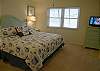 Master bedroom with king size bed & cable TV/DVD.