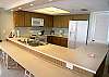 Bright, open kitchen with newer appliances.