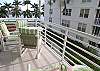The balcony as a view of the lake as well as the pool and bay.