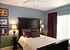 Third bedroom with queen size bed and adjoining bath.