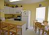 Cheery eat-in kitchen with breakfast bar