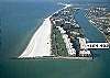 This tropical paradise rests on a quiet beach with a winding boardwalk that encompasses the property.