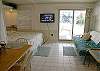 Double futon, king size bed, flatscreen TV/DVD, dining area & sliding glass doors onto your private deck!