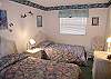 Third bedroom with twin beds.