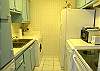 Fully equipped kitchen with ice & water in the door of the refrigerator, smooth top range, full size washer & dryer, compact dishwasher & microwave.