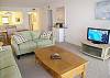 Watch the new flatscreen TV/BluRay or just gaze out at the water, the balcony is off of the living room.