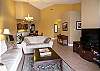Open floorplan with volume ceiling.