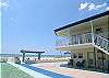 #6 is on this ground floor corner, beachfront with shuffleboard & BBQ nearby.