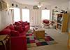 Living Room: Each sofa makes into a sleeper and there is a tv and vcr. This is the most spacious unit at Sea Rocket.