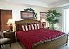 Regal King size bed, sliding doors to the balcony, cable TV/DVD, 2 large closets and adjoining bath.