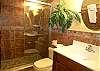 Guest bathroom with beautiful tile shower.