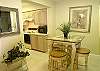 This is the breakfast area, adjacent to the kitchen and utility room.