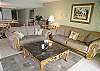 Living room with queen size sleeper sofa and love seat.