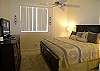 Master Bedroom with king size bed, 32" flatscreen, walk-in closet and adjoining bath with oversized tub/shower.