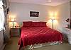 Master bedroom with king size bed (new pillow top mattress and box spring in November 2010), walk-in closet, cable TV and adjoining bath.