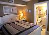 Bedroom with queen size bed, cable TV/DVD, adjoining bath with tub/shower & stacking washer/dryer.