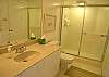 Guest bath room with tile shower.