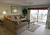 Balcony with Gulf of Mexico view and entertainment armoire with cable TV/DVD/VCR.