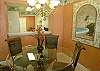 Elegant dining area seats four.