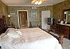 TV, walk-in closet and adjoining bath