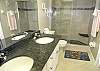 Master Bath with tile shower and granite topped double vanity
