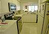 Kitchen with new stainless steel Range &amp; Microwave