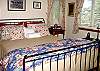 The largest of the three bedrooms offers a queen size bed.