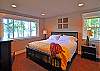 Third master bedroom with king bed is upstairs. Room also has TV.
