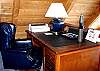The master bedroom loft also has a writing desk for those reflective moments