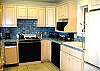 This well equipped and beautiful kitchen is a joy to cook in.