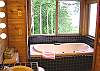 Relax in the master bedroom's jetted soaking tub. Master bath also offers a shower stall.