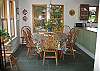 The dining area is adjacent to the kitchen.