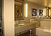 A lower level bathroom with tub and separate shower.