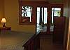 Lower queen bedroom opens to terrace and the hot tub.