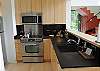 Bamboo flooring and paperstone counters are among the environmental conscientous choices of finishings.