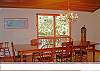 The large dining table has seating for nine.