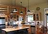 Open floor plan includes the kitchen, dining, and living areas. Note that the loft is decorative only.