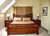 A king size bed is located in the master bedroom.