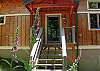 The stairway that leads up to the front door.
